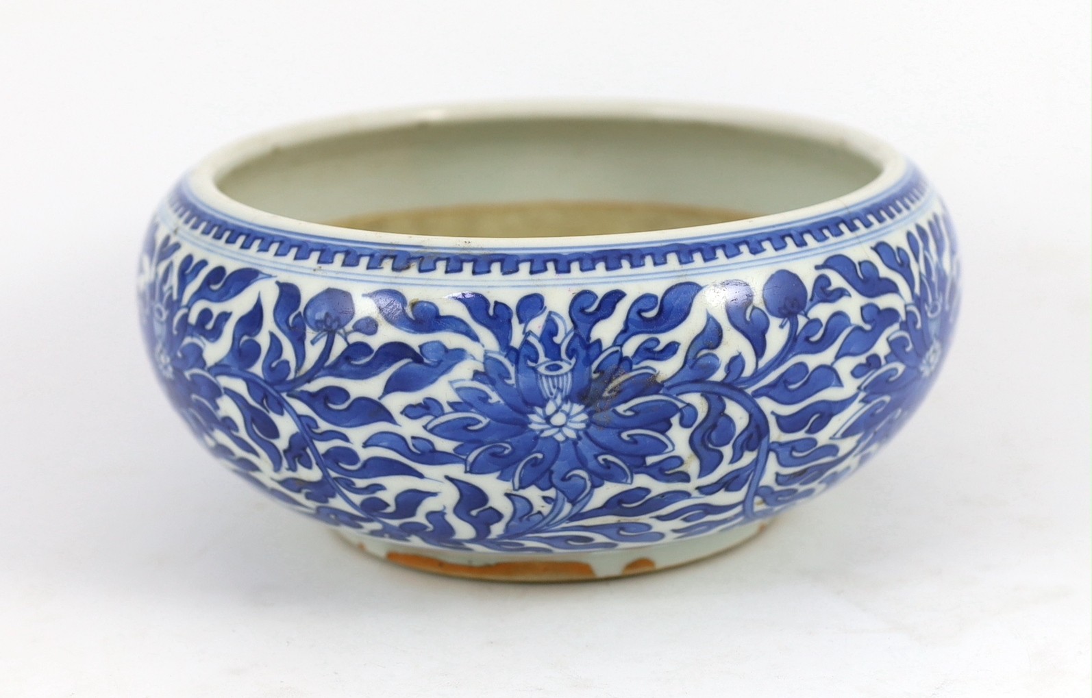 A Chinese blue and white ‘alms’ bowl or censer, cyclical date for the 56th year of the reign of Kangxi corresponding to 1717 and of the period, 21cm diameter 9cm high, two hairline cracks